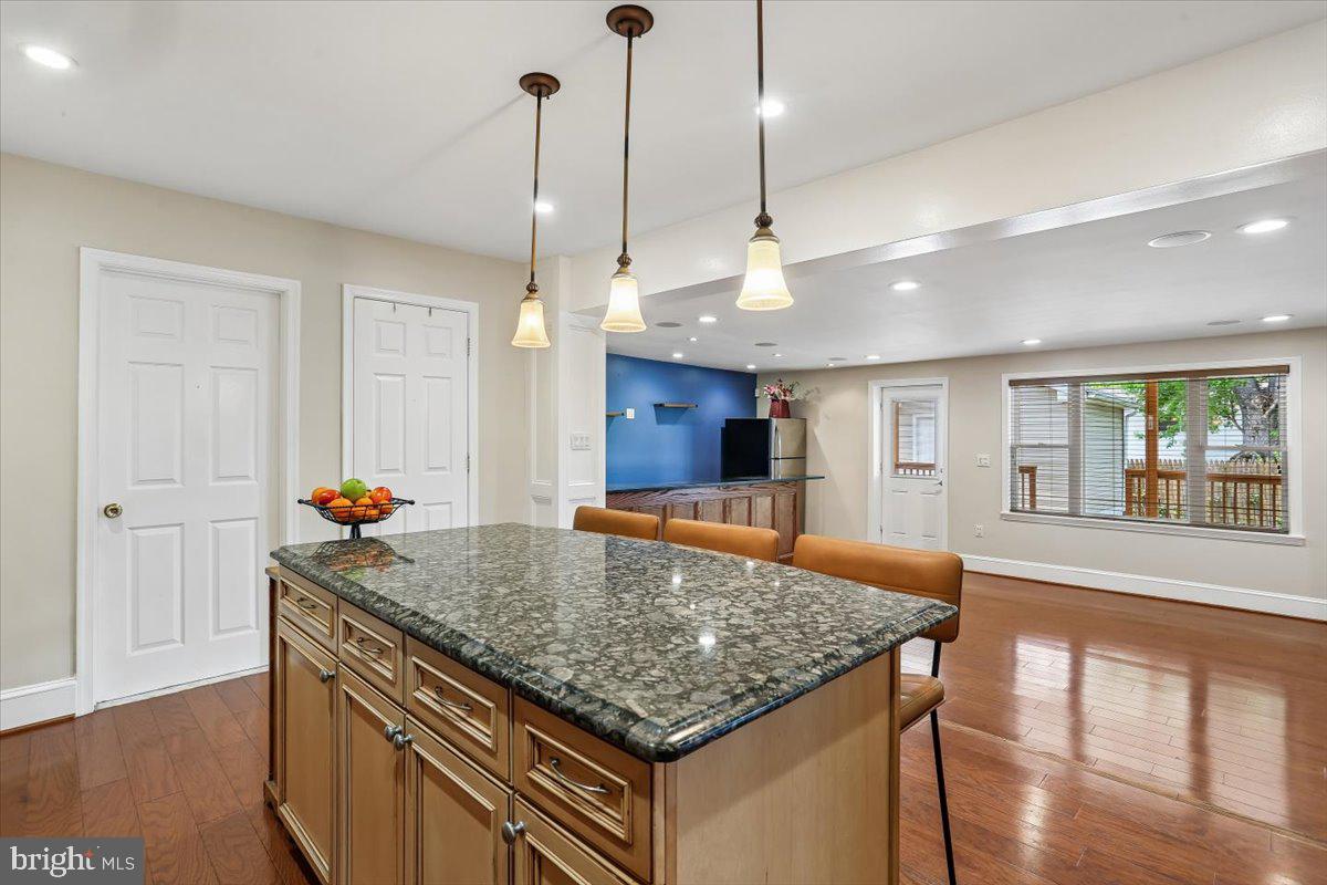 3709 Kenway Street Silver Spring, MD 20906 - Photo 6 of 34 a kitchen with stainless steel appliances granite countertop a stove and refrigerator