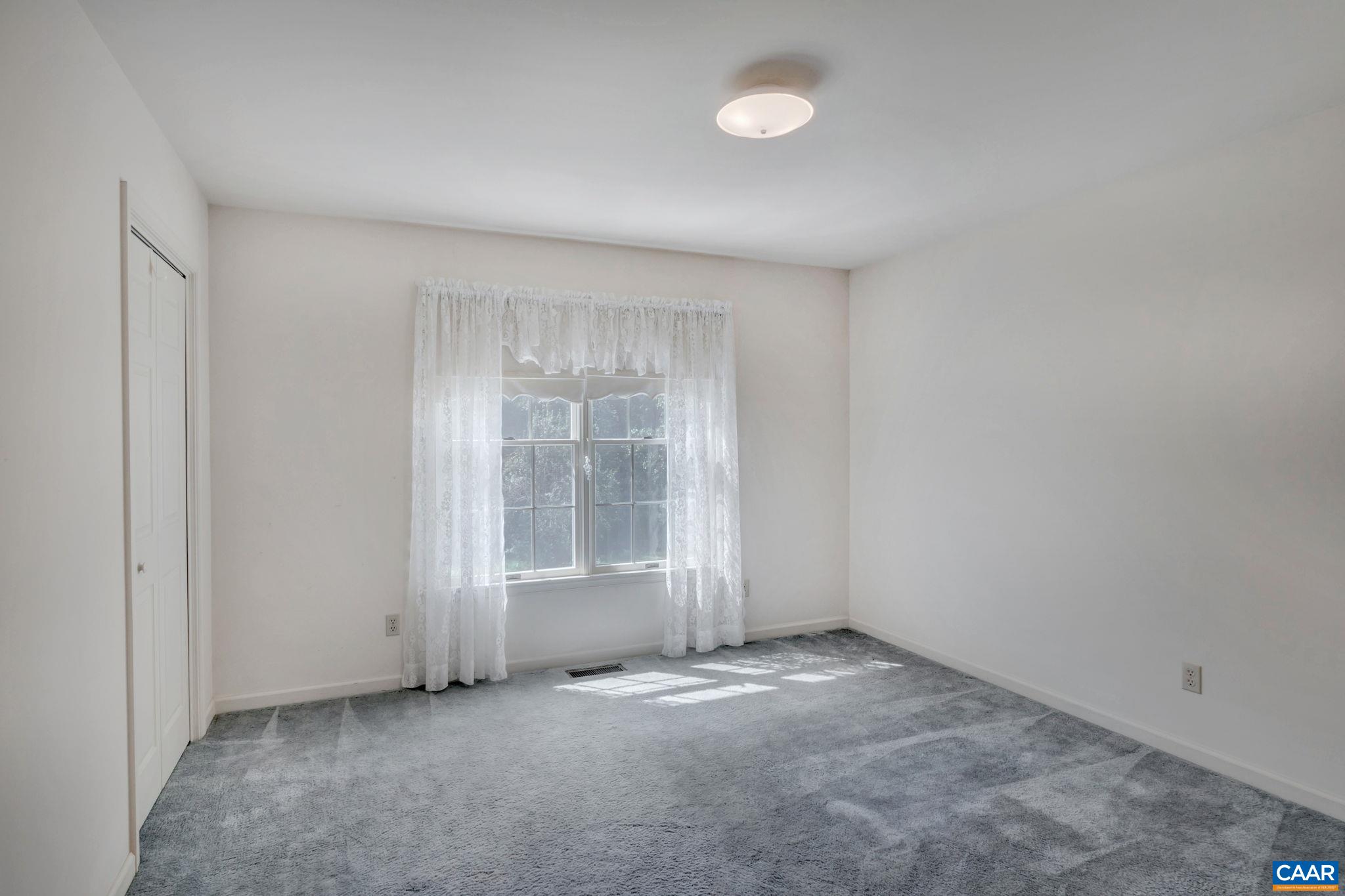 9795 Critzer Shop Road Afton, VA 22920 - Photo 14 of 22 an empty room with windows