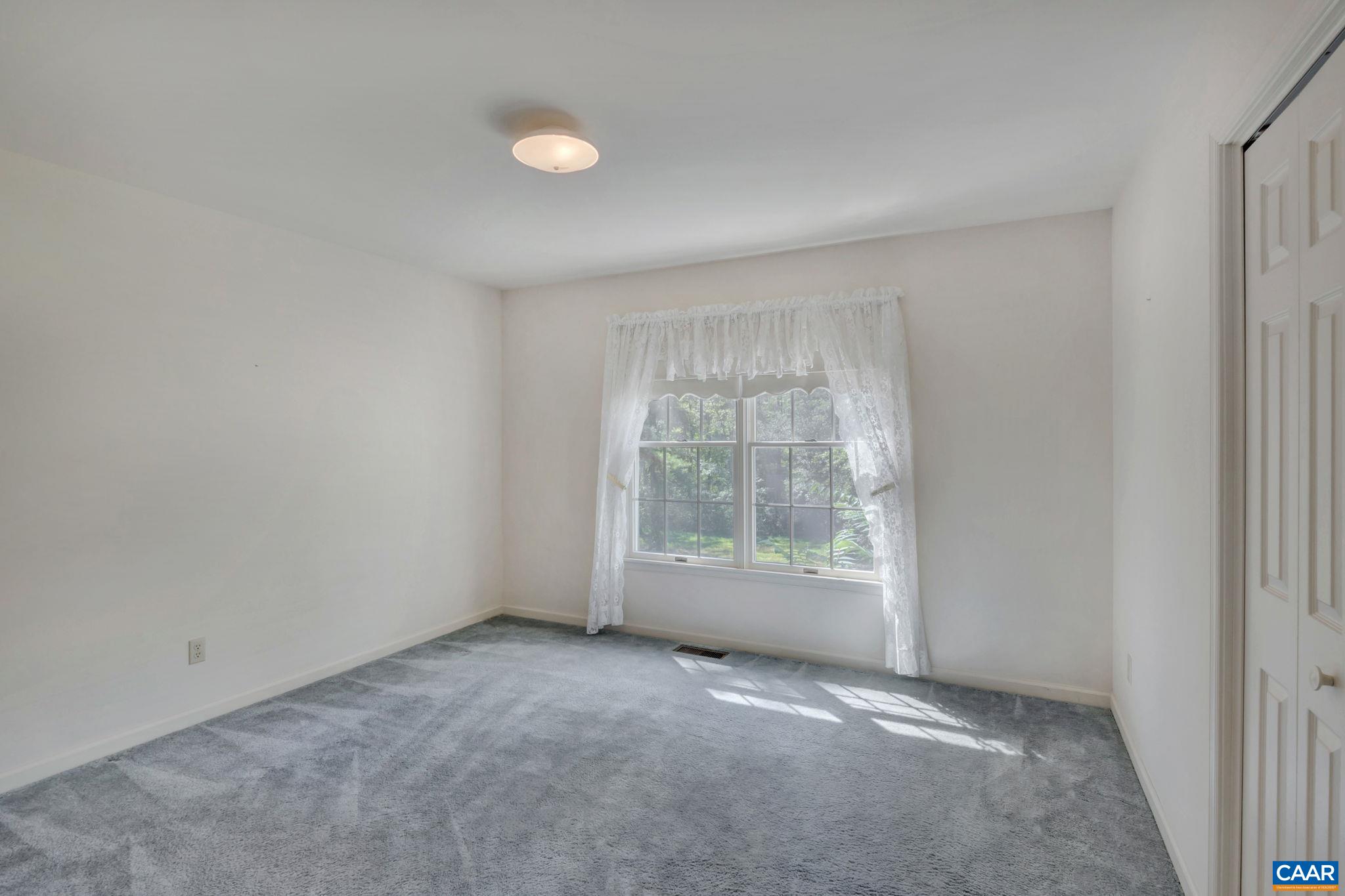 9795 Critzer Shop Road Afton, VA 22920 - Photo 15 of 22 an empty room with windows and view of an empty room
