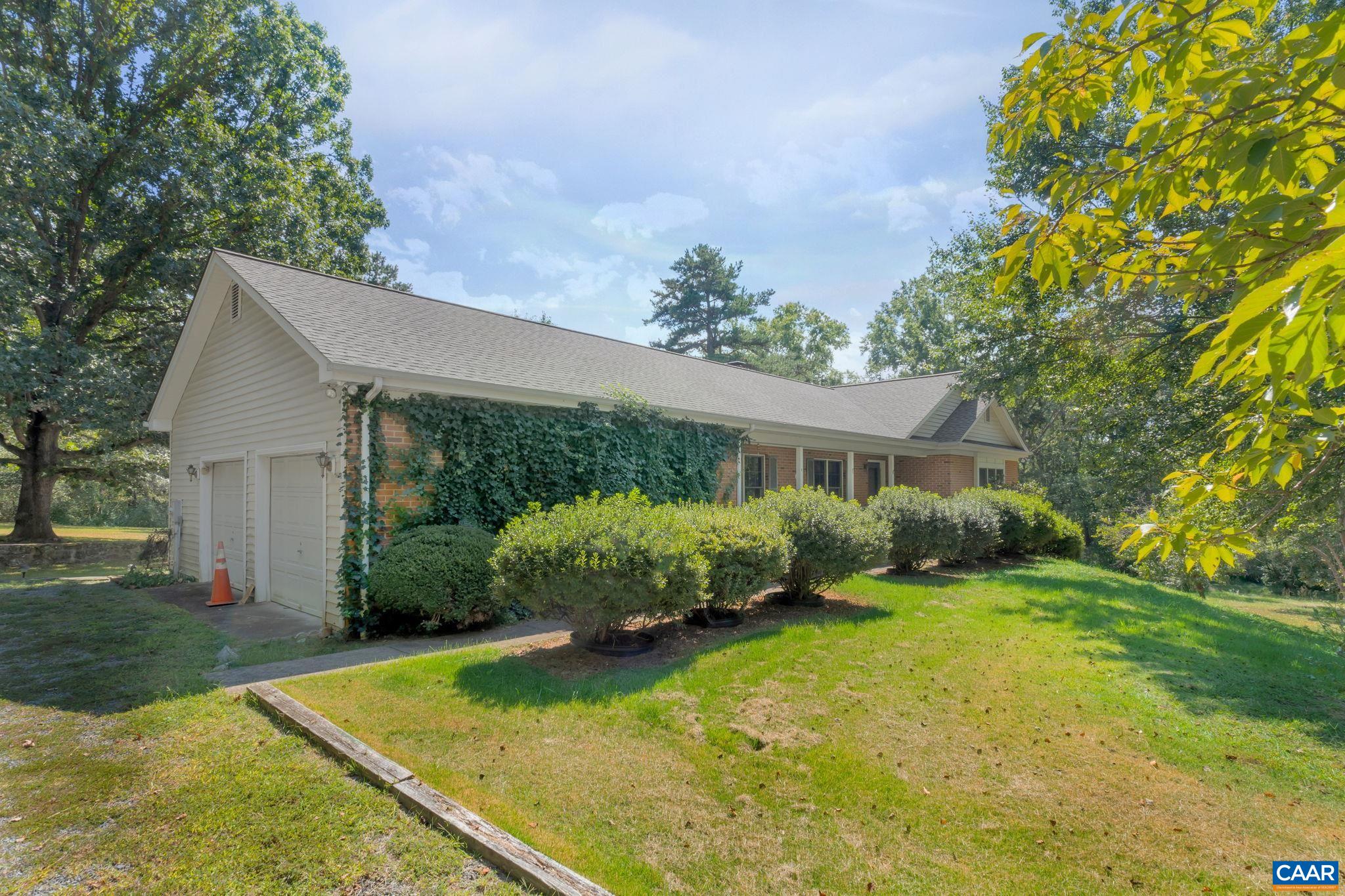 9795 Critzer Shop Road Afton, VA 22920 - Photo 22 of 22 a front view of a house with garden