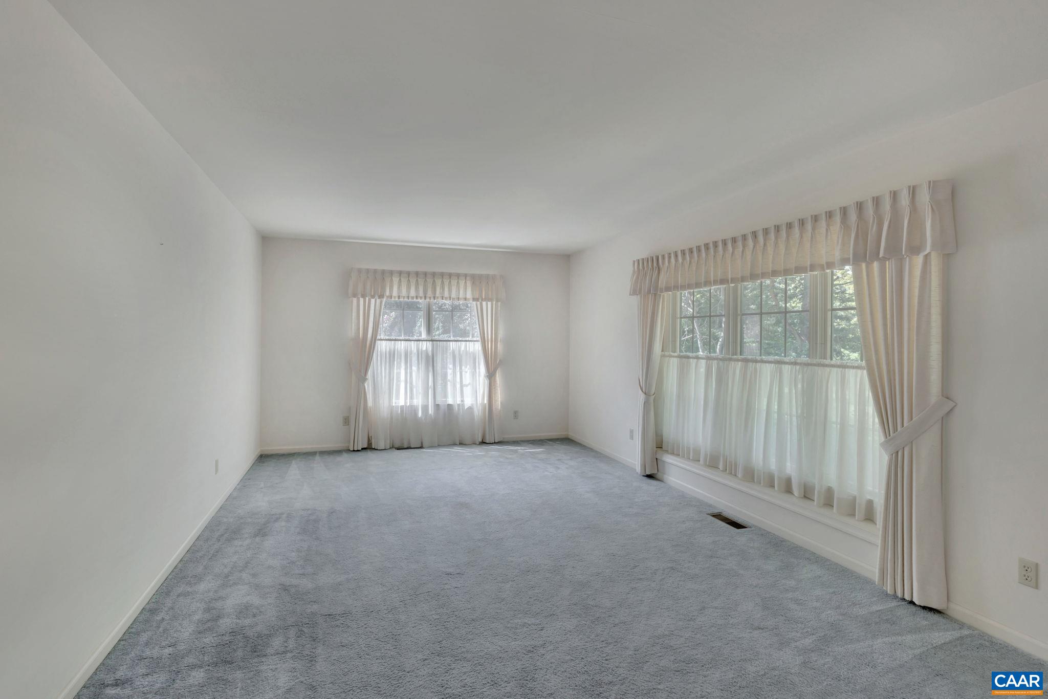 9795 Critzer Shop Road Afton, VA 22920 - Photo 4 of 22 an empty room with sliding door