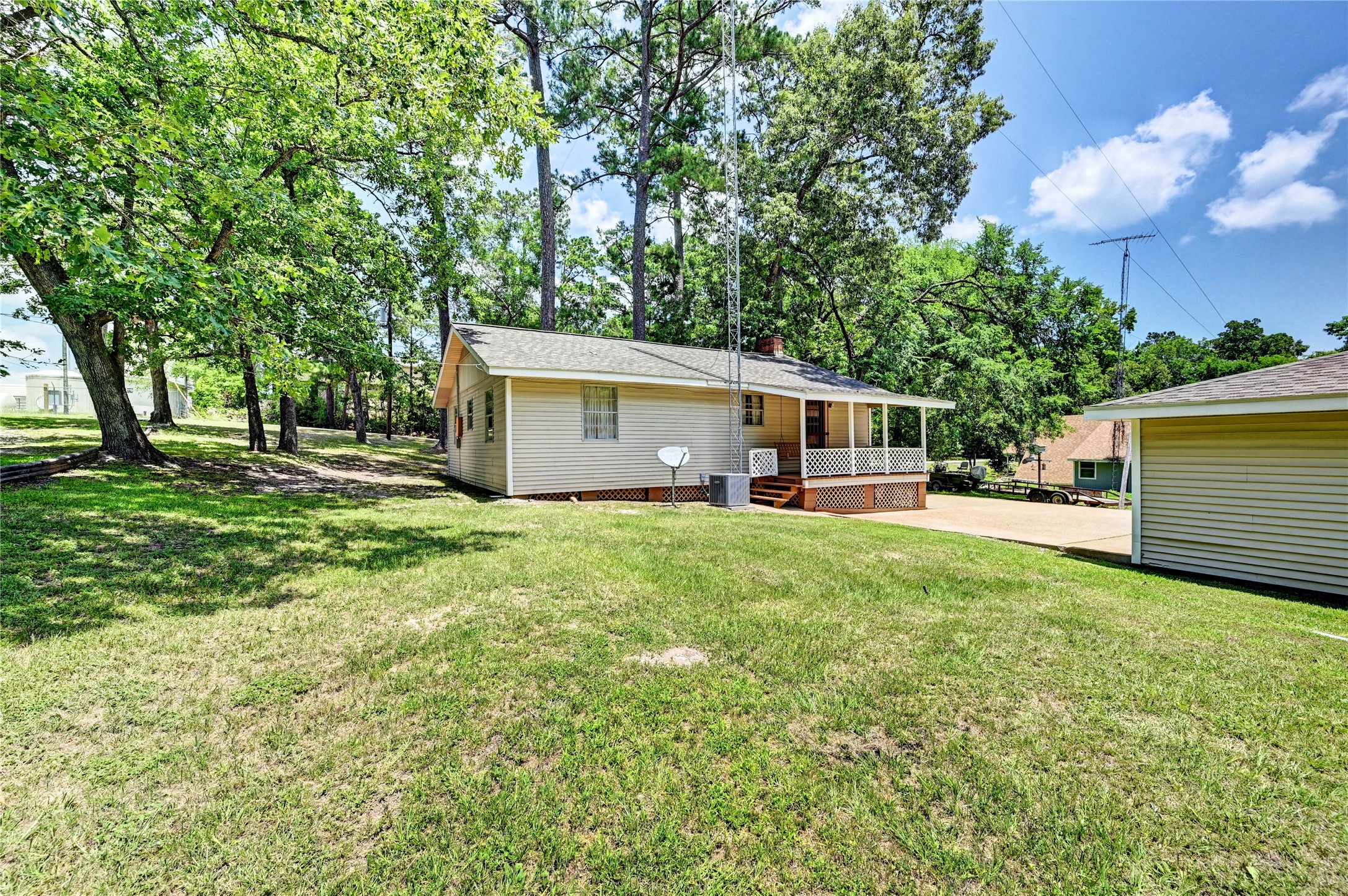 6 Hickory Hollow Road Huntsville, TX 77320 - Photo 12 of 44 a front view of house with yard and green space