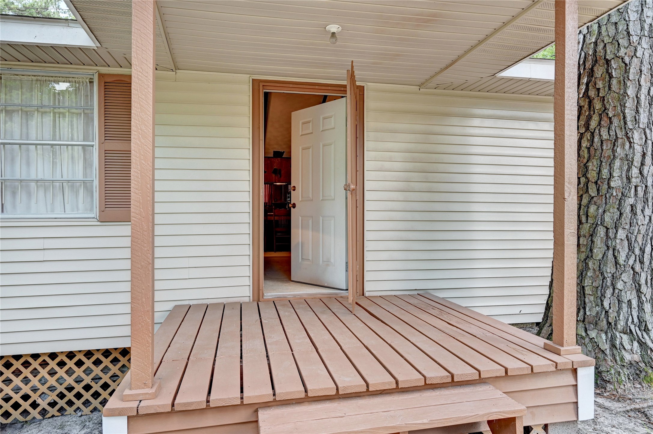 6 Hickory Hollow Road Huntsville, TX 77320 - Photo 15 of 44 a view of a roof deck