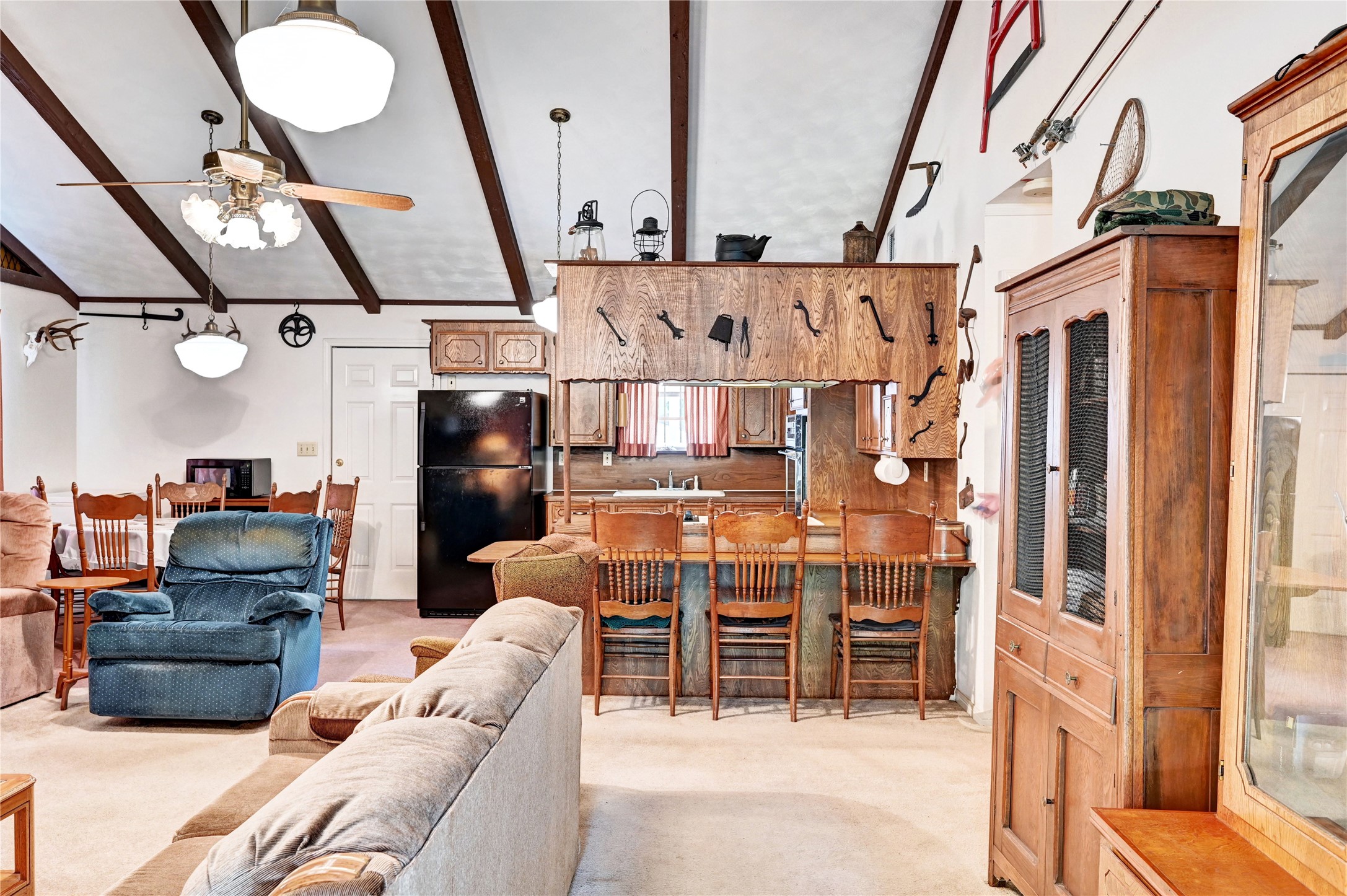 6 Hickory Hollow Road Huntsville, TX 77320 - Photo 17 of 44 a view of a livingroom with furniture and a flat screen tv