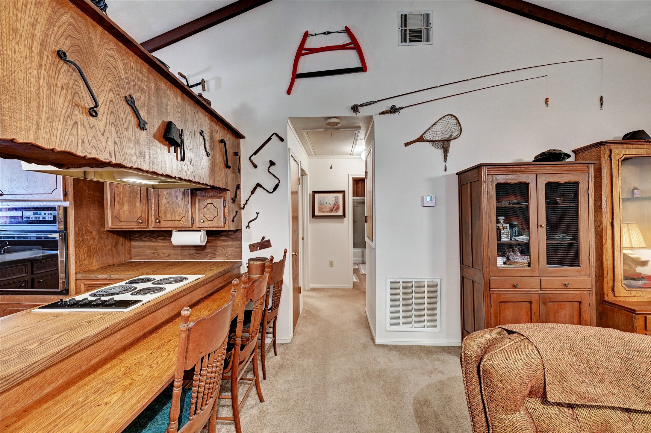 6 Hickory Hollow Road Huntsville, TX 77320 - Photo 29 of 44 a view of a kitchen with stainless steel appliances granite countertop a stove and a refrigerator