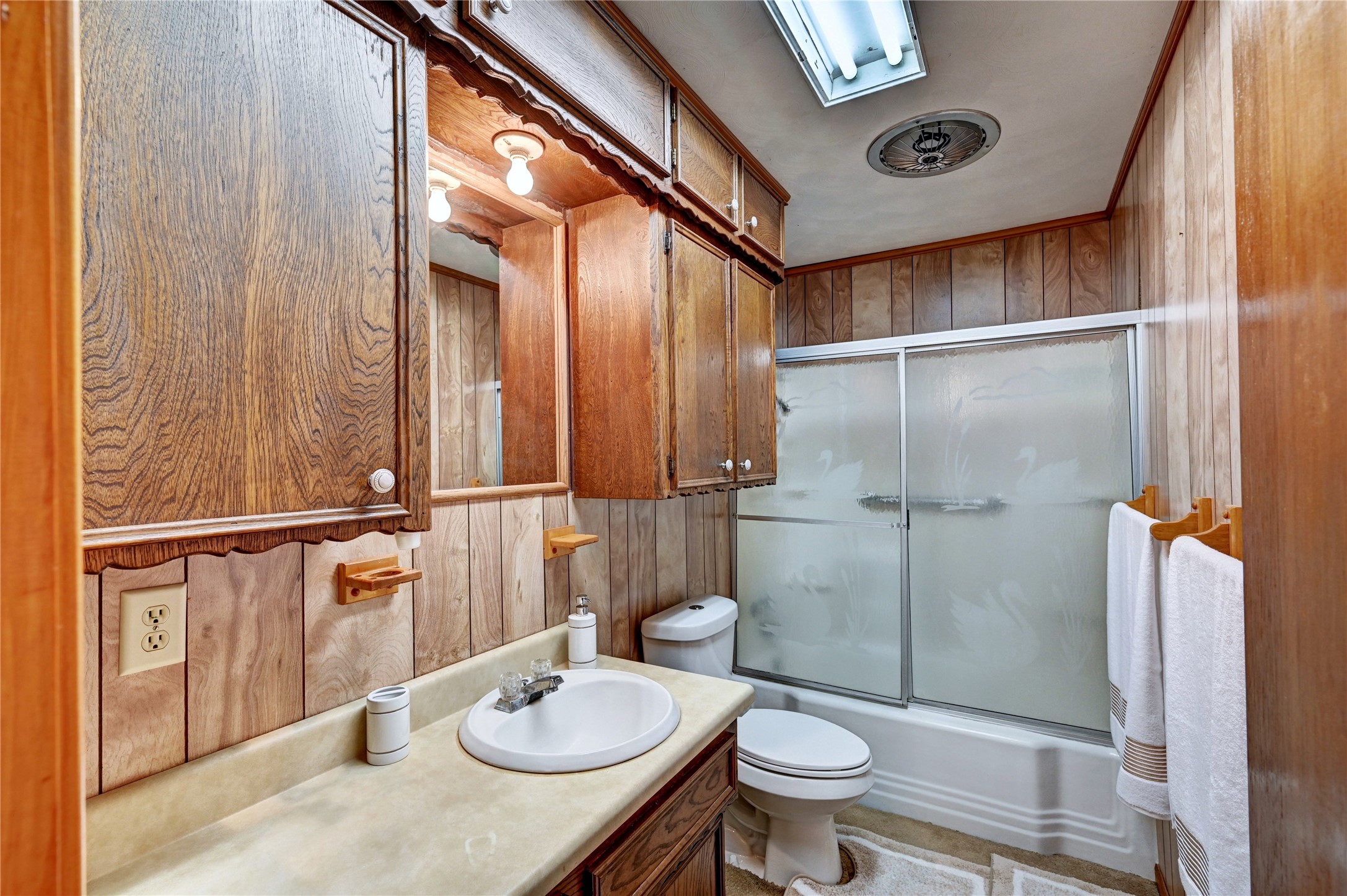 6 Hickory Hollow Road Huntsville, TX 77320 - Photo 32 of 44 a bathroom with a sink toilet and shower