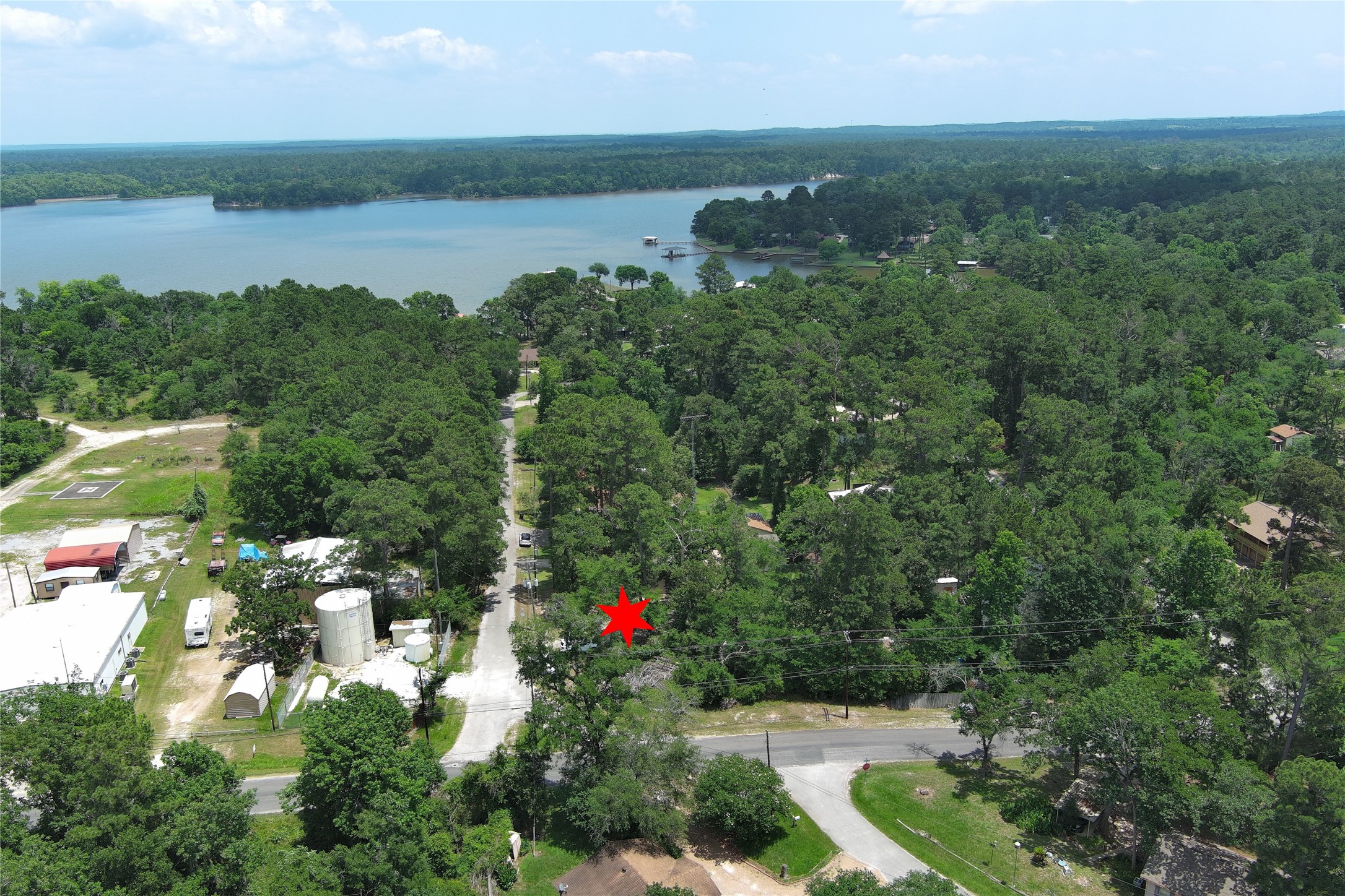 6 Hickory Hollow Road Huntsville, TX 77320 - Photo 41 of 44 a view of lake with house