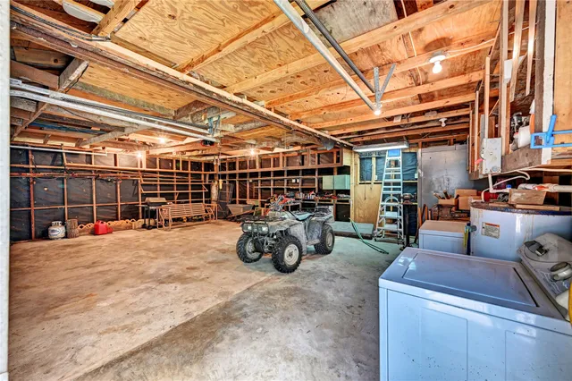 a view of a garage with cars