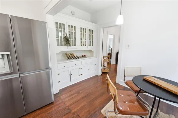 a living room with fireplace furniture and a flat screen tv