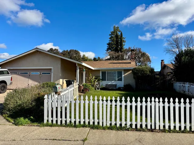 a front view of house with yard