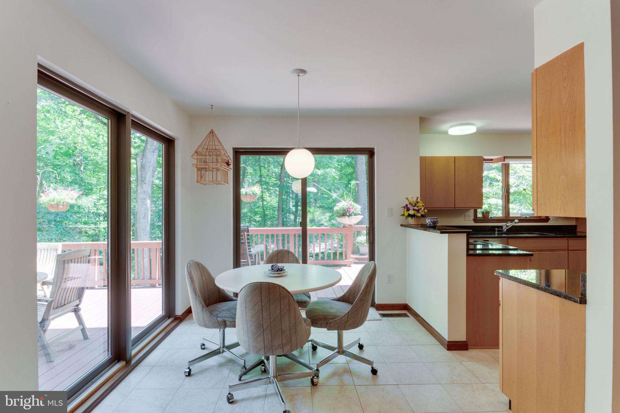 6230 Park Road McLean, VA 22101 - Photo 11 of 54 Breakfast room & doors to deck