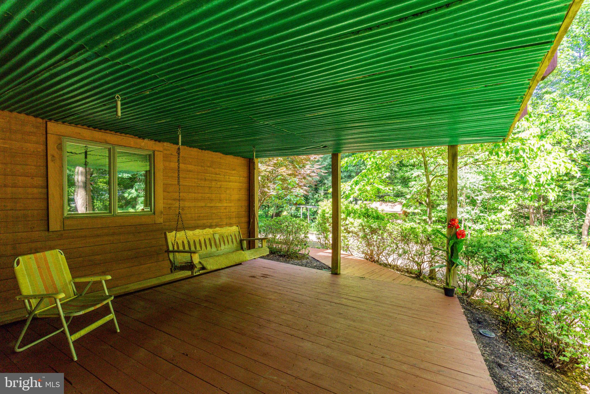 6230 Park Road McLean, VA 22101 - Photo 51 of 54 Lower level deck with hanging chair swing