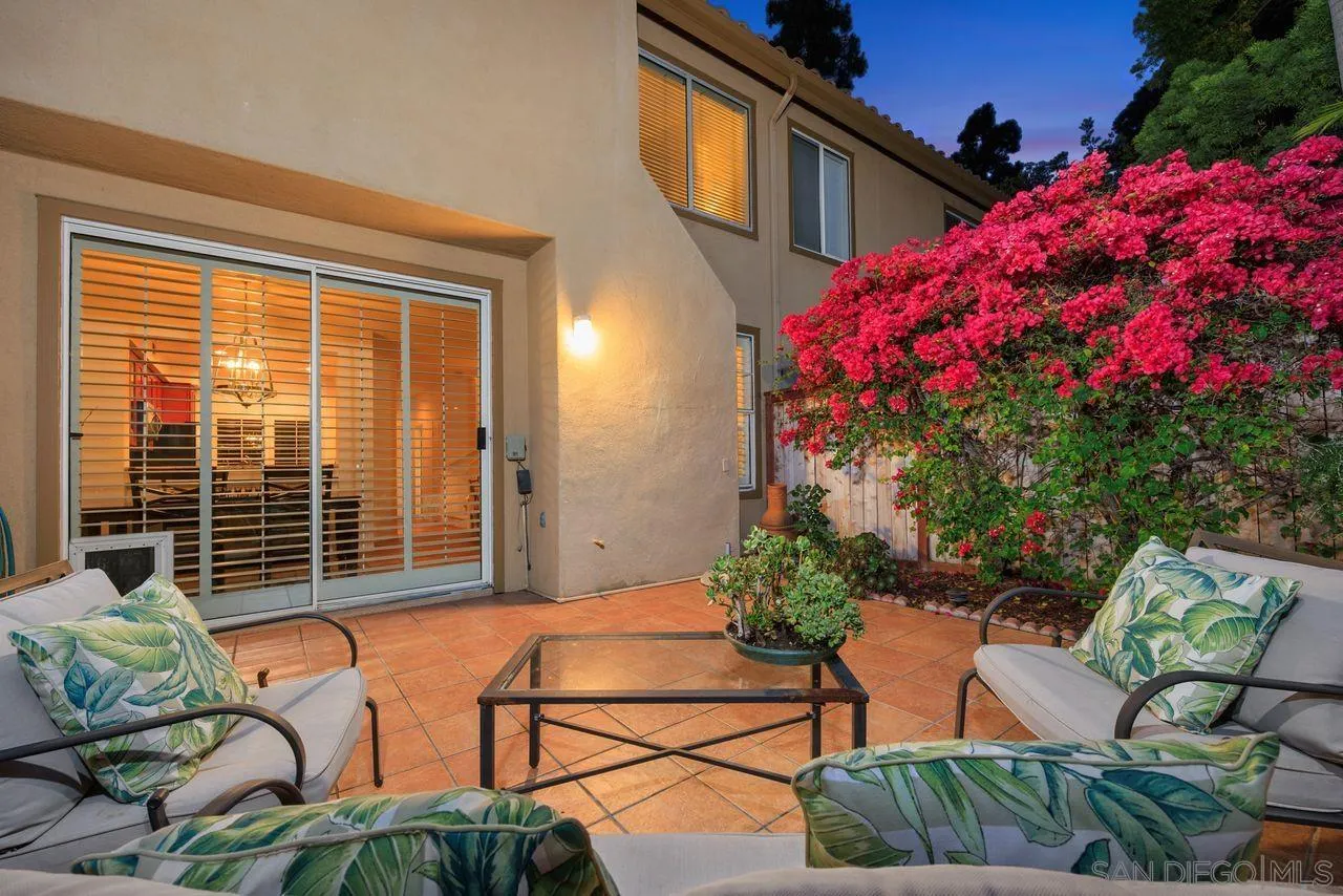 3965 Via Holgura San Diego, CA 92130 - Photo 2 of 45 a backyard of a house with seating space