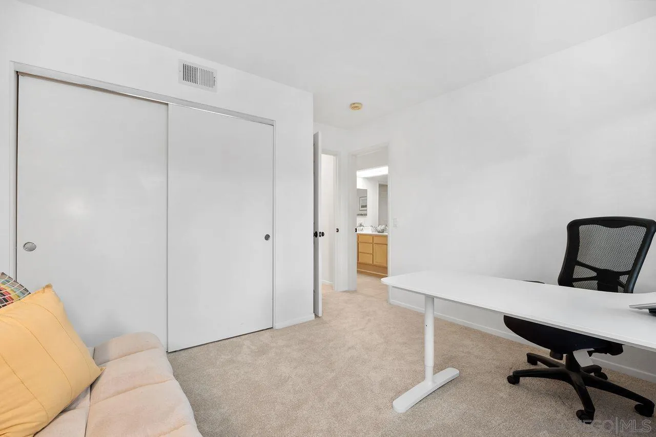 3965 Via Holgura San Diego, CA 92130 - Photo 25 of 45 a view of a livingroom with a workspace