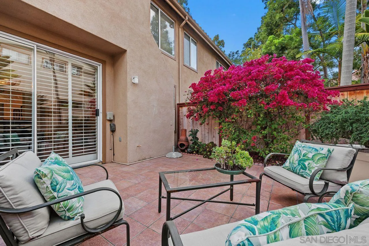 3965 Via Holgura San Diego, CA 92130 - Photo 30 of 45 a view of a house with backyard and sitting area