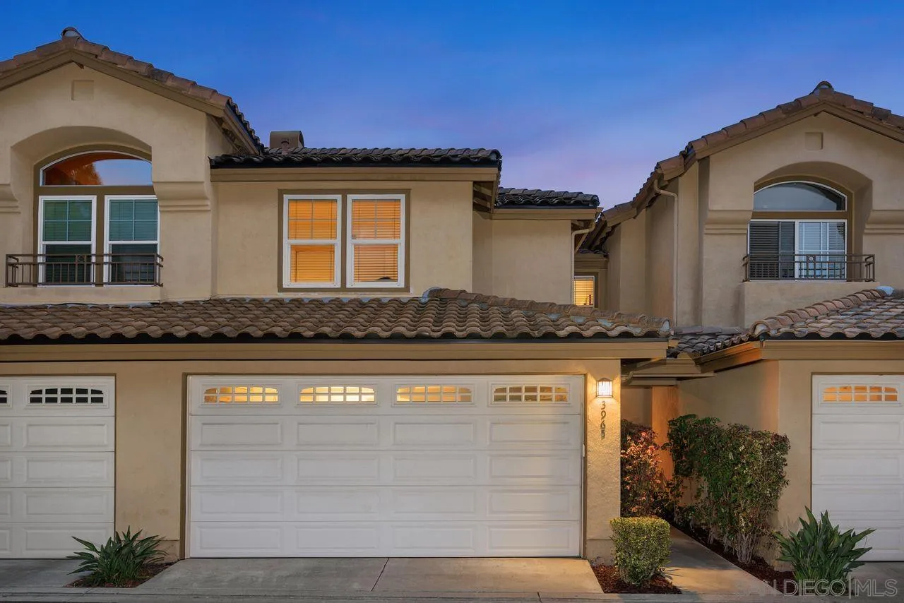 3965 Via Holgura San Diego, CA 92130 - Photo 41 of 45 a front view of a house with a yard