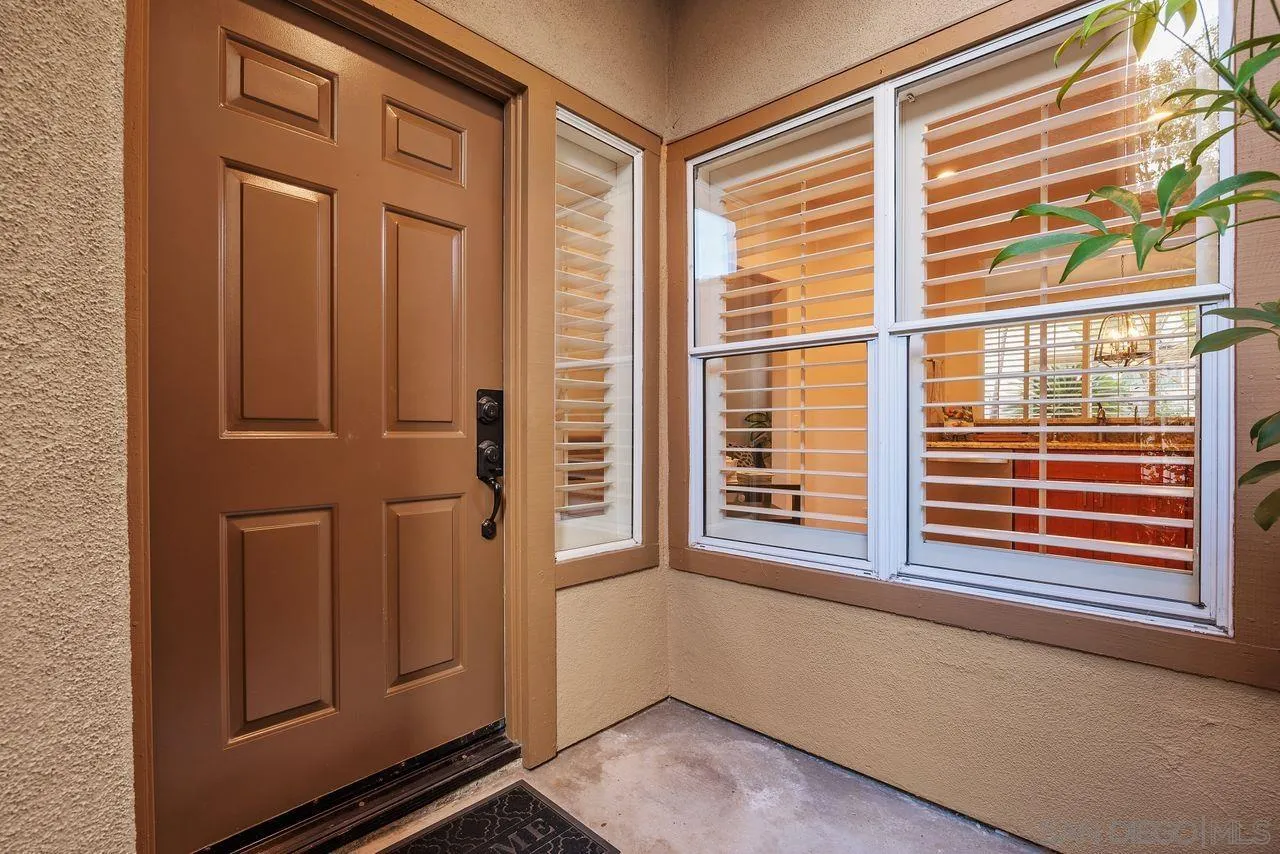 3965 Via Holgura San Diego, CA 92130 - Photo 42 of 45 a view of a door and a window
