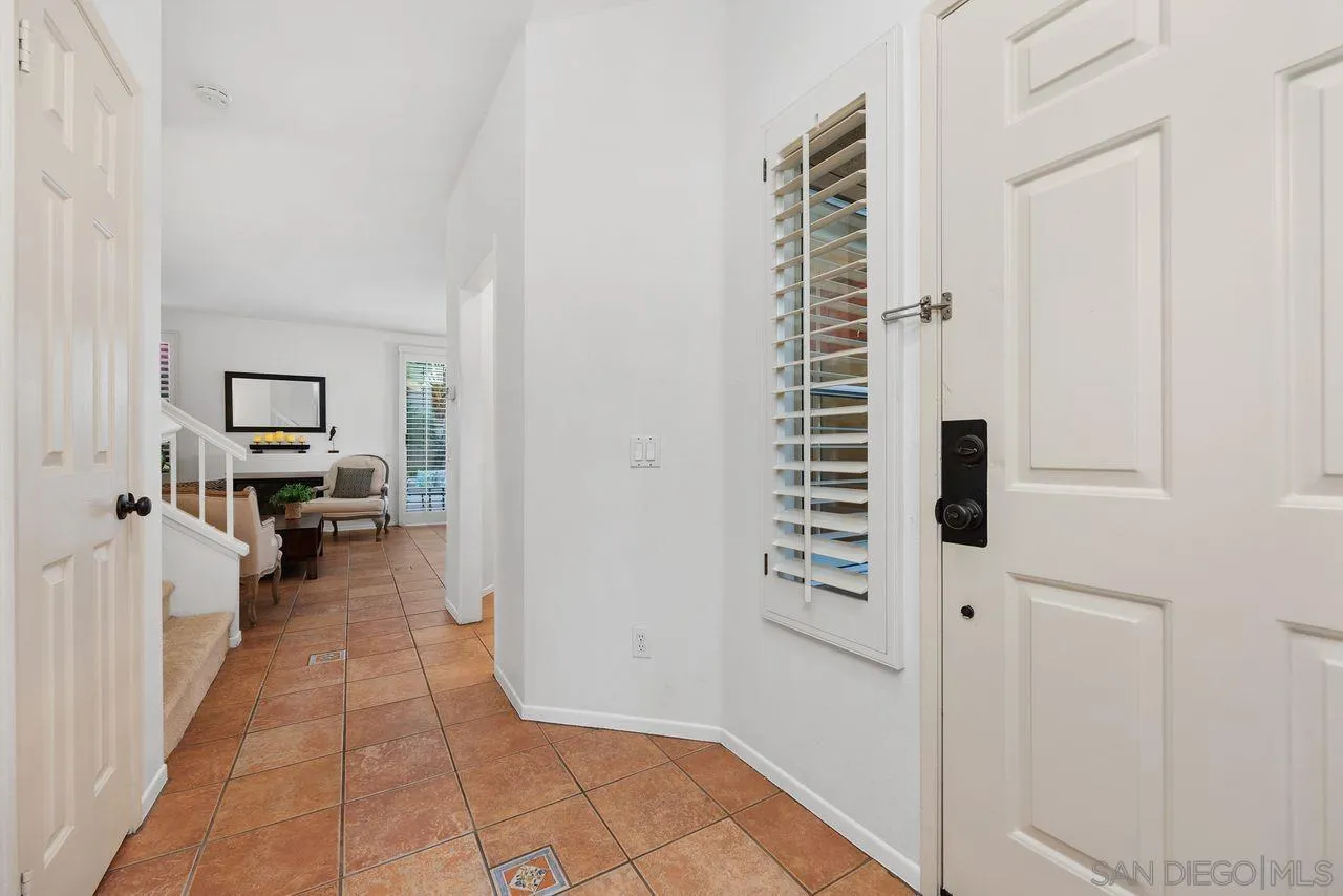 3965 Via Holgura San Diego, CA 92130 - Photo 45 of 45 a view of a living room and utility room