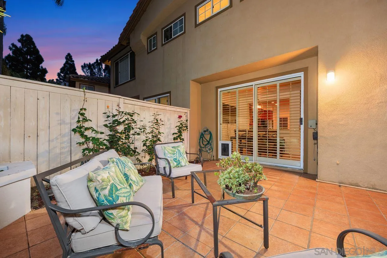 3965 Via Holgura San Diego, CA 92130 - Photo 5 of 45 view of backyard with outdoor seating and plants