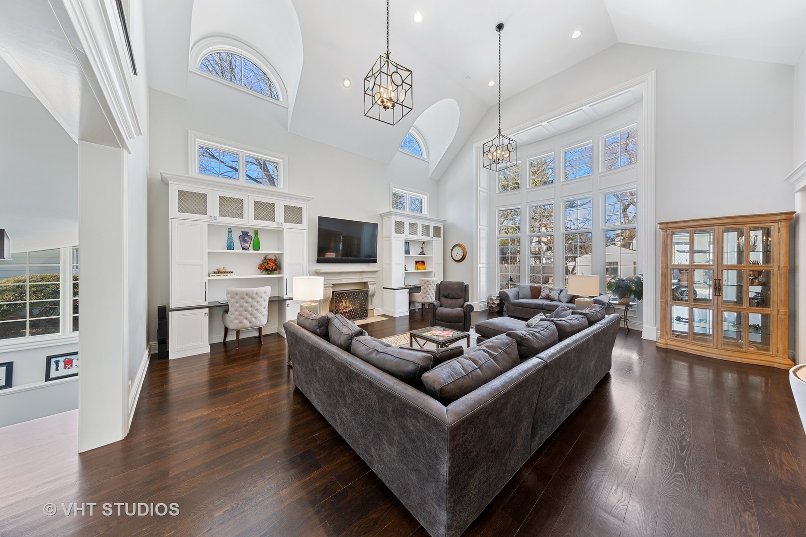 2144 Woodlawn Road Northbrook, IL 60062 - Photo 2 of 45 a living room with fireplace furniture and a wooden floor
