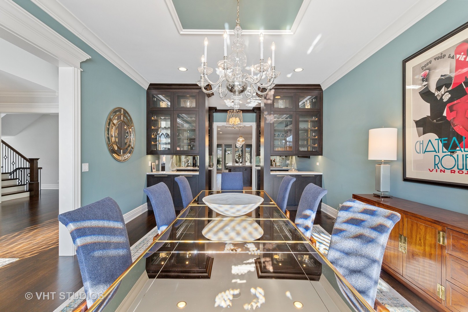 2144 Woodlawn Road Northbrook, IL 60062 - Photo 13 of 45 a view of a dining room with furniture a chandelier and wooden floor