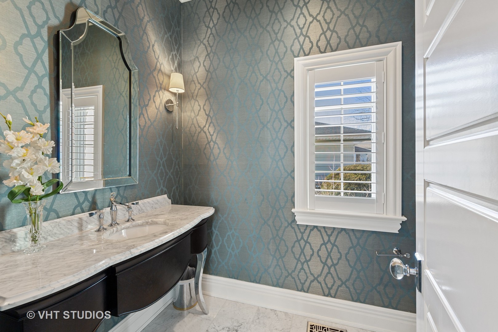 2144 Woodlawn Road Northbrook, IL 60062 - Photo 20 of 45 a bathroom with a granite countertop sink a toilet and a mirror