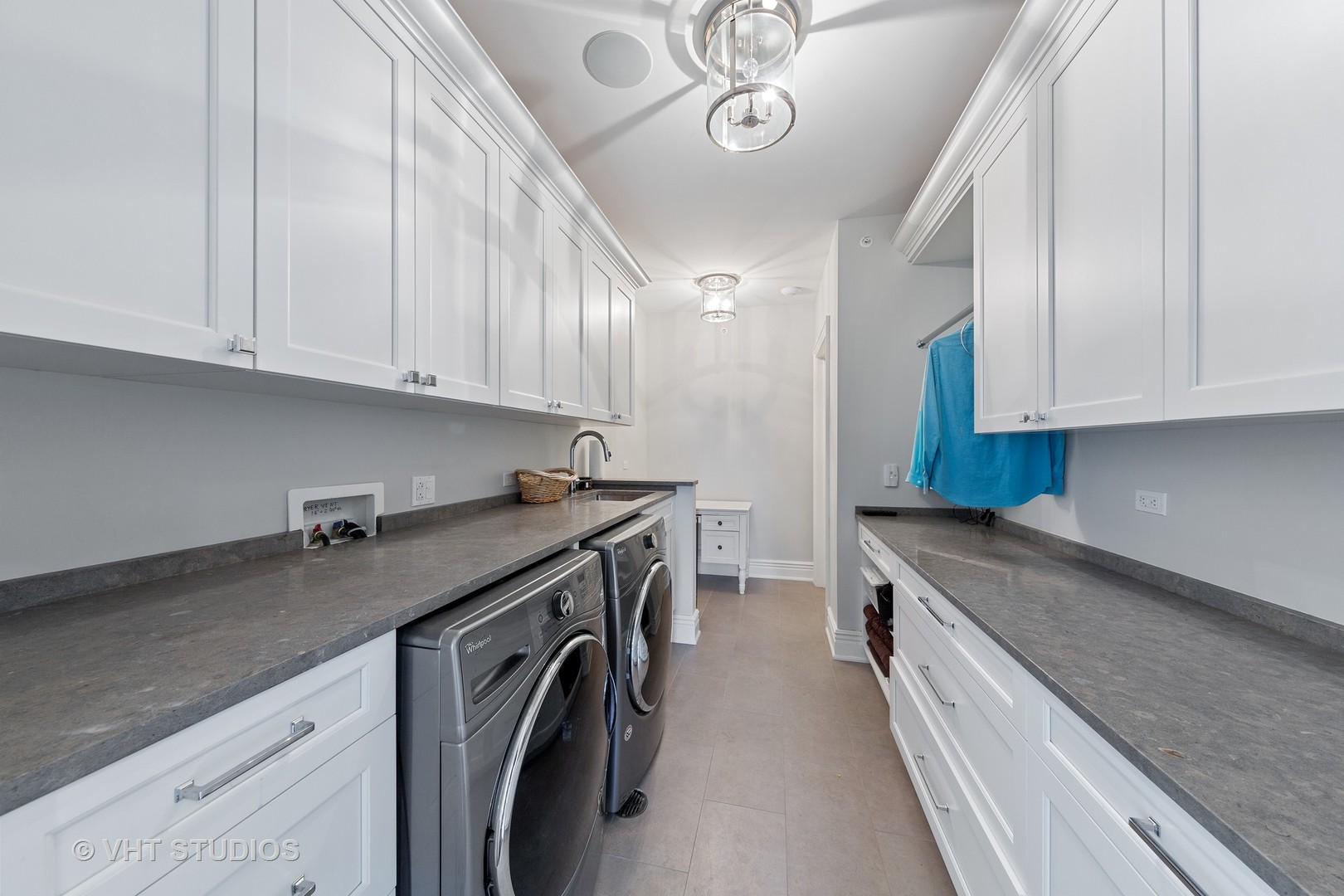 2144 Woodlawn Road Northbrook, IL 60062 - Photo 26 of 45 a kitchen with a sink stove and cabinets