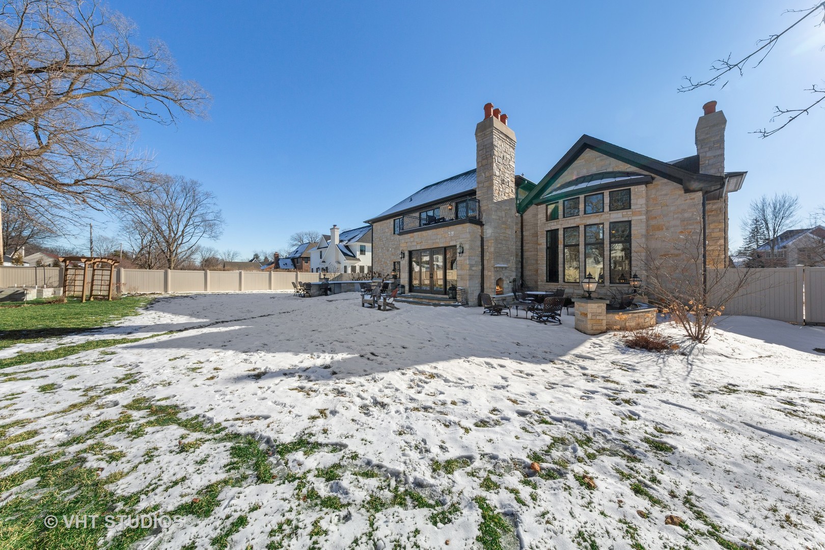 2144 Woodlawn Road Northbrook, IL 60062 - Photo 40 of 45 a view of a house with snow on the ground