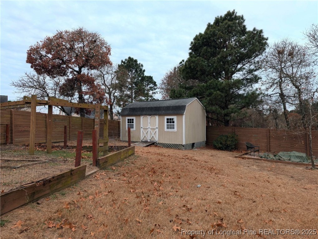 45 Copper Loop Sanford, NC 27332 - Photo 28 of 30 a view of a house with a yard