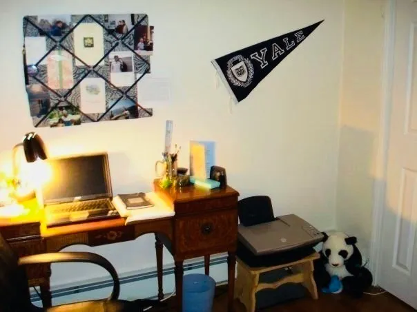 a workspace with furniture and lamp