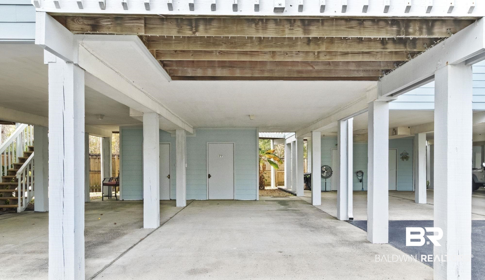 25861 Canal Road, Unit 77 Orange Beach, AL 36561 - Photo 38 of 48 View of patio / terrace featuring stairs
