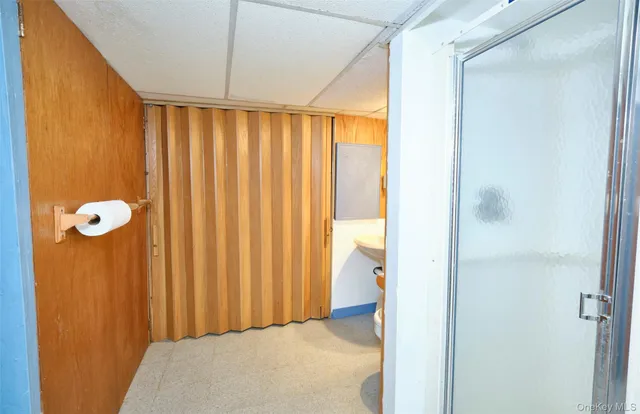 a view of balcony with wooden floor and fence