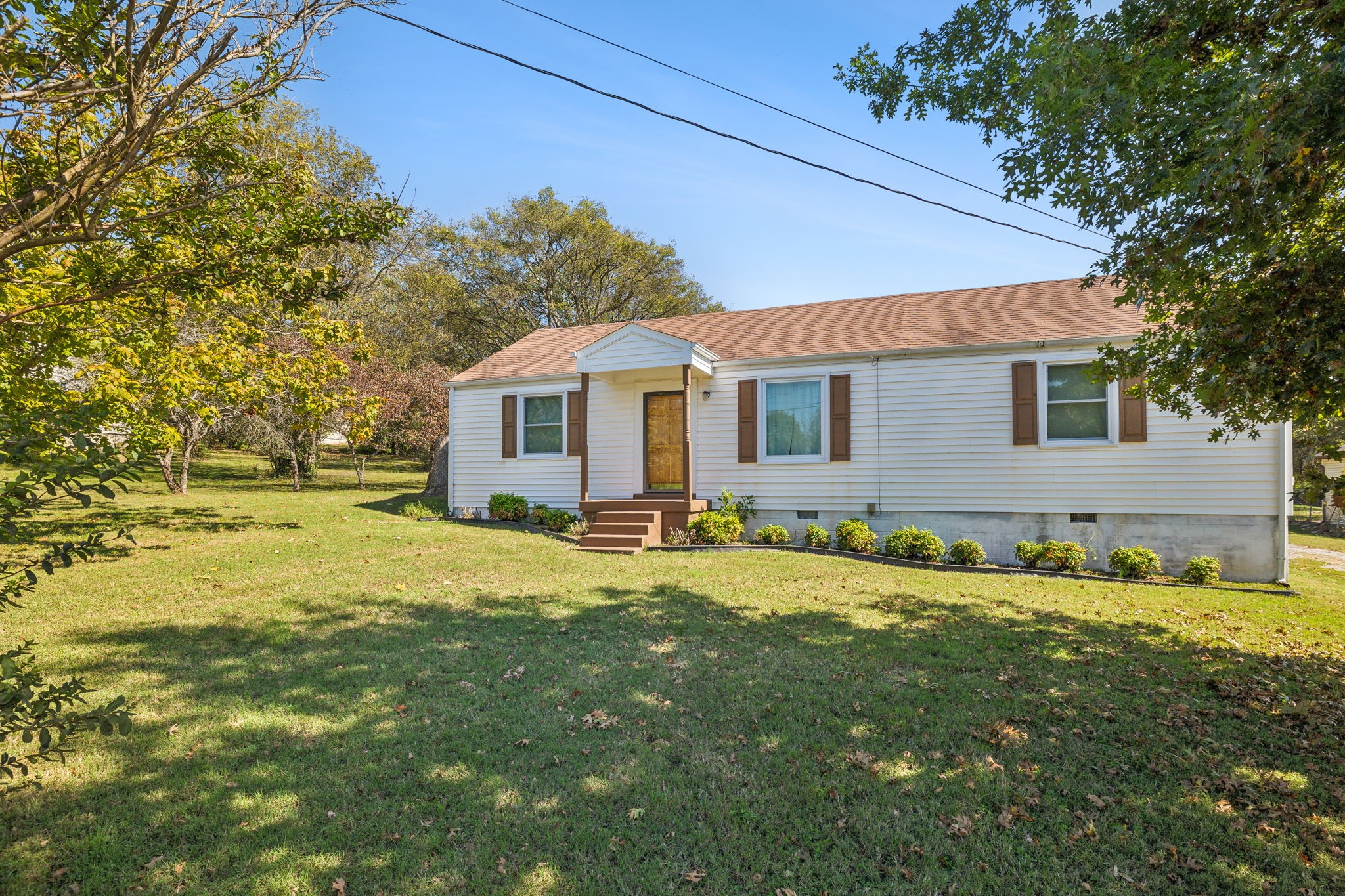 309 Randy Road Madison, TN 37115 - Photo 3 of 46 a front view of a house with a yard
