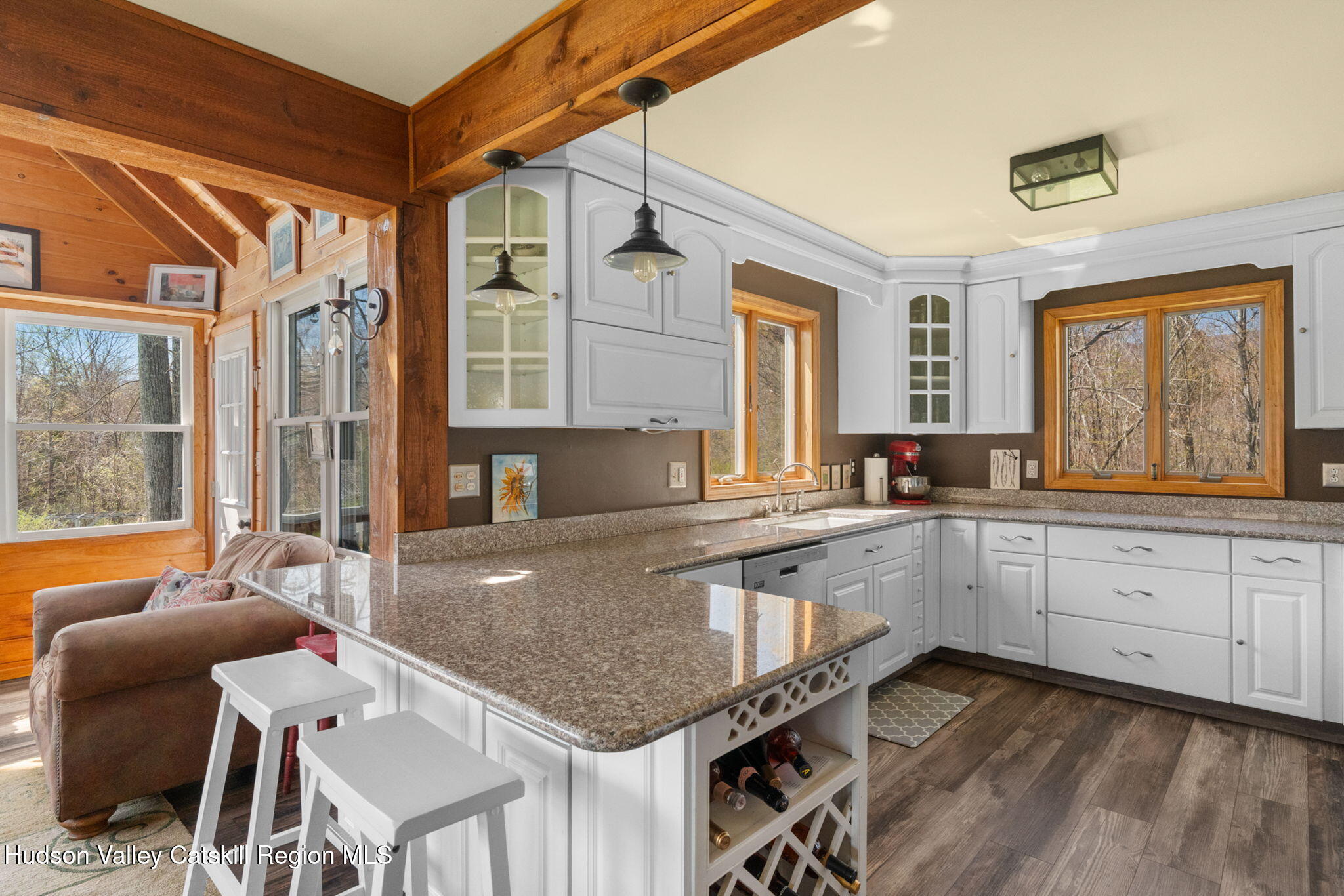 285 County Road 20 Cairo, NY 12413 - Photo 11 of 50 a white kitchen with granite countertop a stove and white cabinets