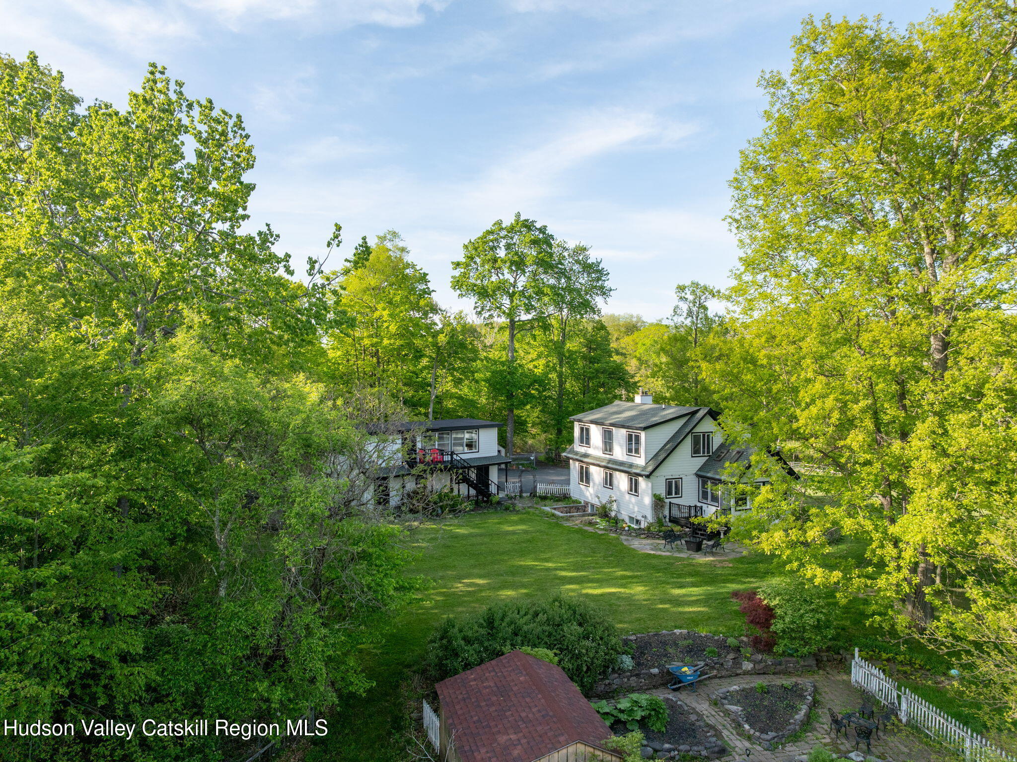 285 County Road 20 Cairo, NY 12413 - Photo 2 of 50 a view of a bench in a garden