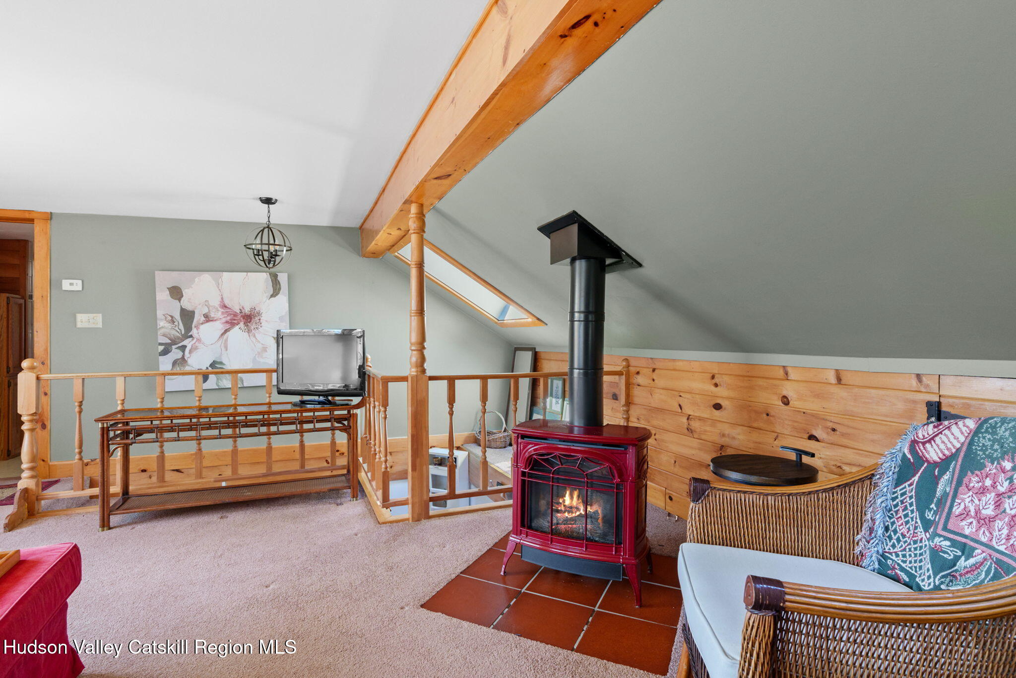 285 County Road 20 Cairo, NY 12413 - Photo 33 of 50 a living room with furniture a rug and a fireplace