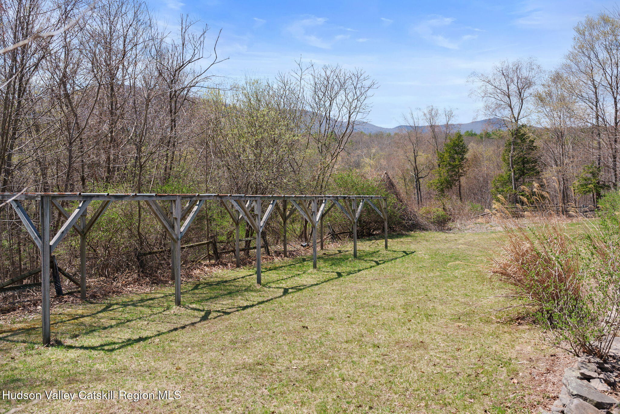 285 County Road 20 Cairo, NY 12413 - Photo 44 of 50 a view of a wooden bridge with large trees