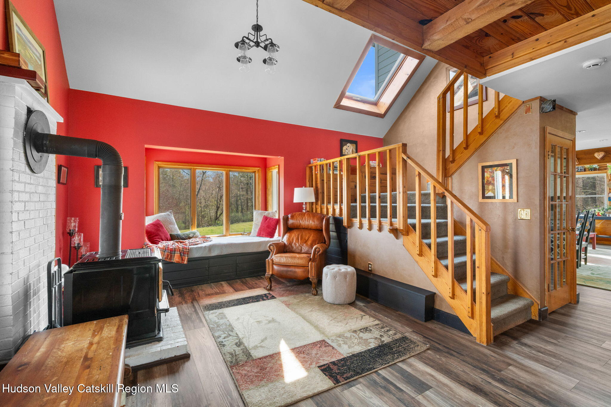 285 County Road 20 Cairo, NY 12413 - Photo 7 of 50 a living room with furniture a rug and a chandelier
