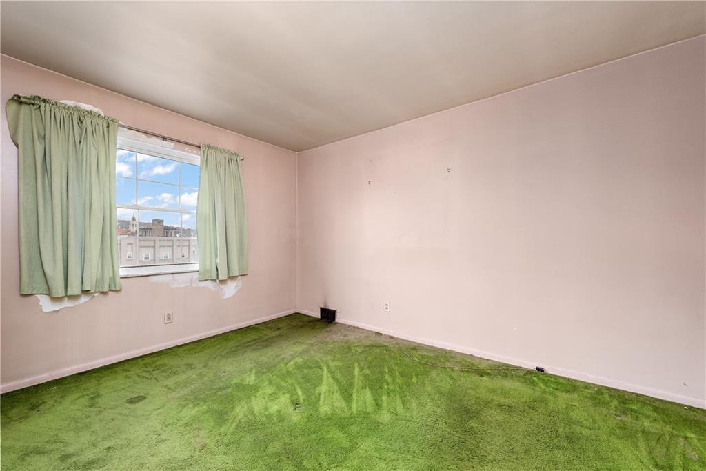 801 Frank Street McKees Rocks, PA 15136 - Photo 16 of 25 a view of an empty room with a window