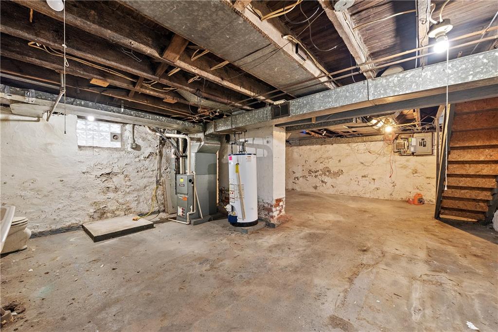 801 Frank Street McKees Rocks, PA 15136 - Photo 23 of 25 a view of a room with wooden walls