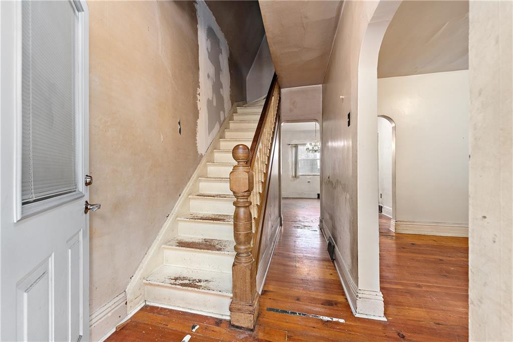 801 Frank Street McKees Rocks, PA 15136 - Photo 5 of 25 a view of a hallway with wooden floor and entryway