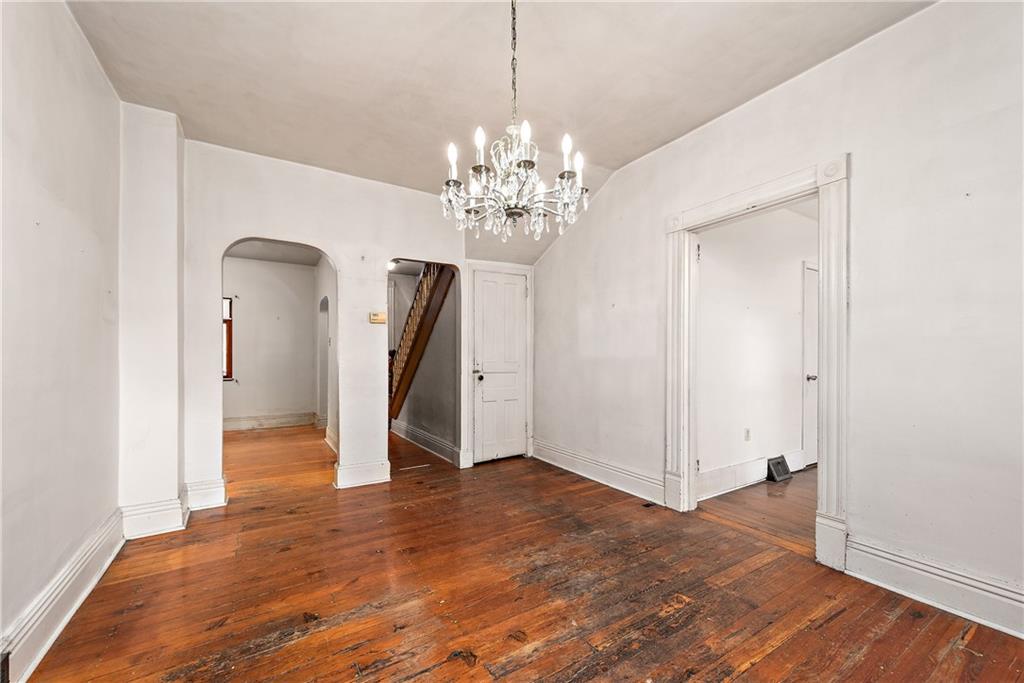 801 Frank Street McKees Rocks, PA 15136 - Photo 8 of 25 a view of a chandelier in big room and a chandelier fan