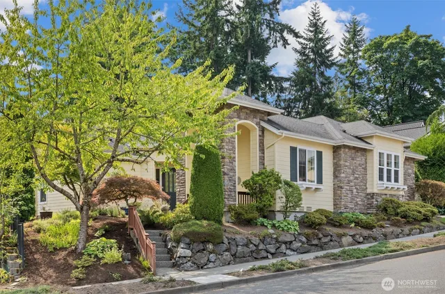 a view of a house with a tree