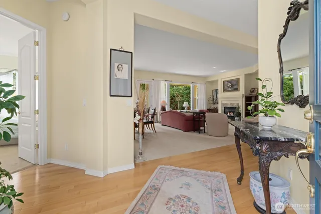 a living room with furniture and a rug