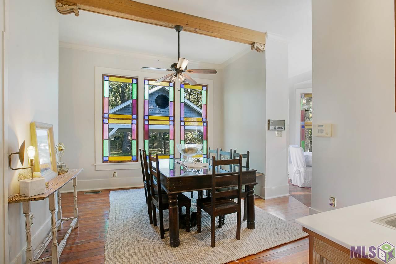 8325 Highland Road Baton Rouge, LA 70808 - Photo 15 of 34 Gorgeous Stained Glass Windows...Cypress Beams and Corbels.