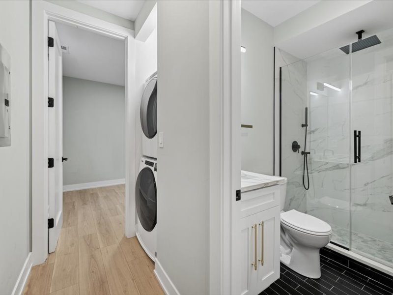 2818 West Fletcher Street, Unit CH Chicago, IL 60618 - Photo 5 of 16 a bathroom with a toilet and a shower