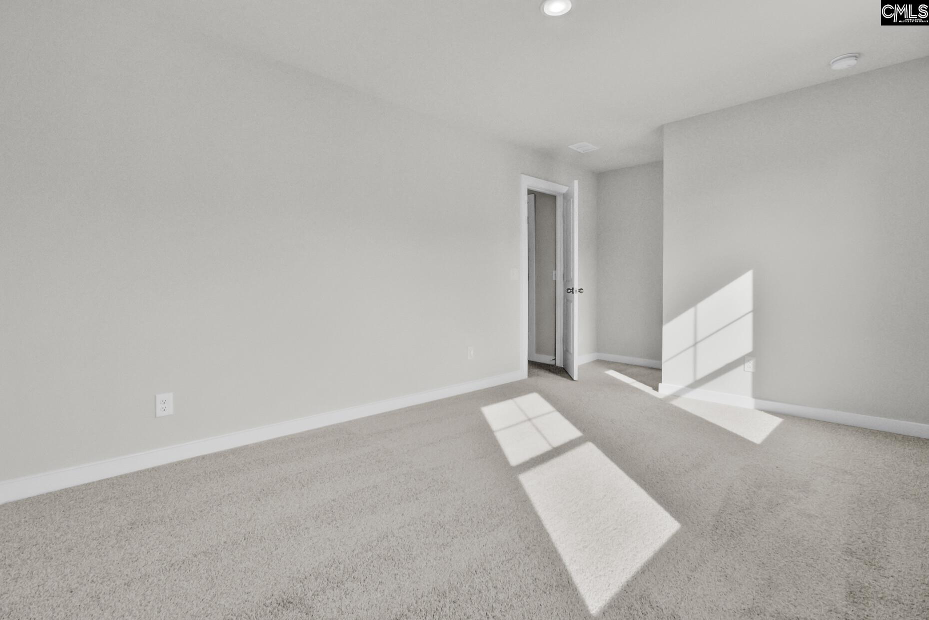 320 Brass Billion Path Lexington, SC 29073 - Photo 29 of 39 an empty room with white walls