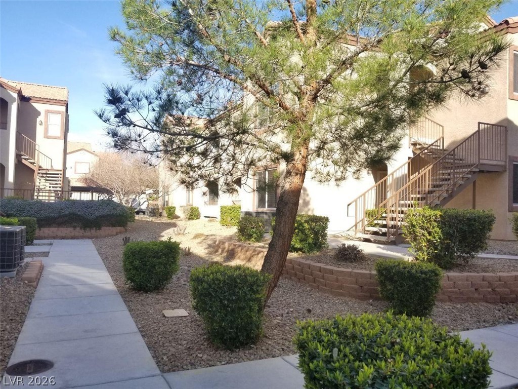 9580 West Reno Avenue, Unit 283 Las Vegas, NV 89148 - Photo 2 of 19 View of home's community featuring stairs