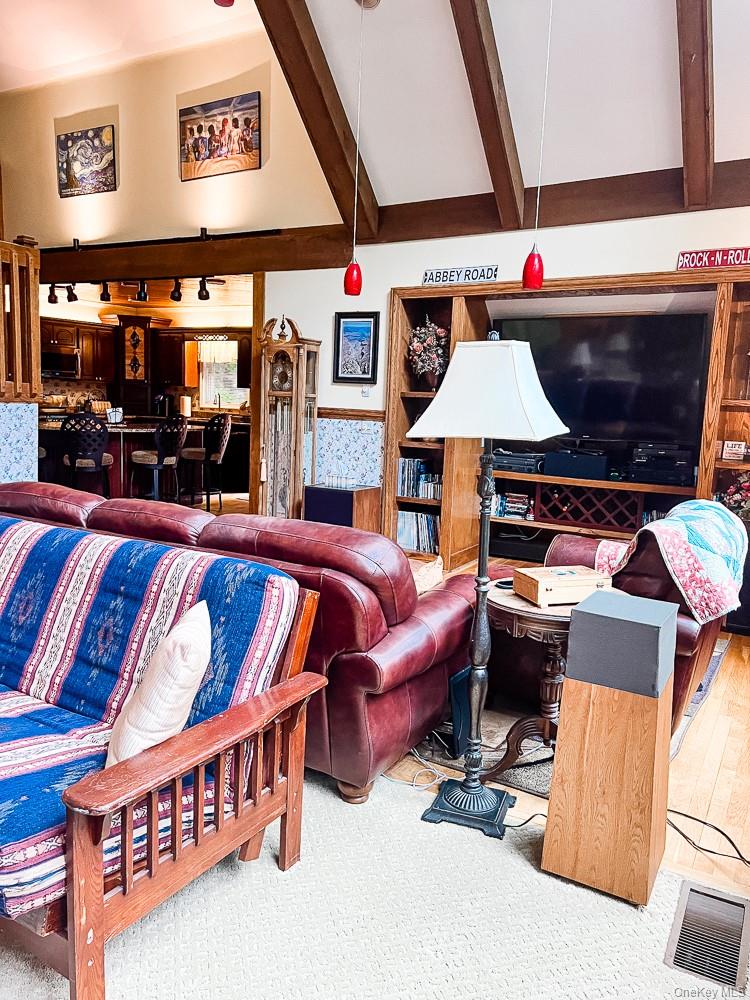 100 Old Tacy Road, Unit TR95 Bethel, NY 12783 - Photo 23 of 50 Living area featuring carpet floors and rail lighting