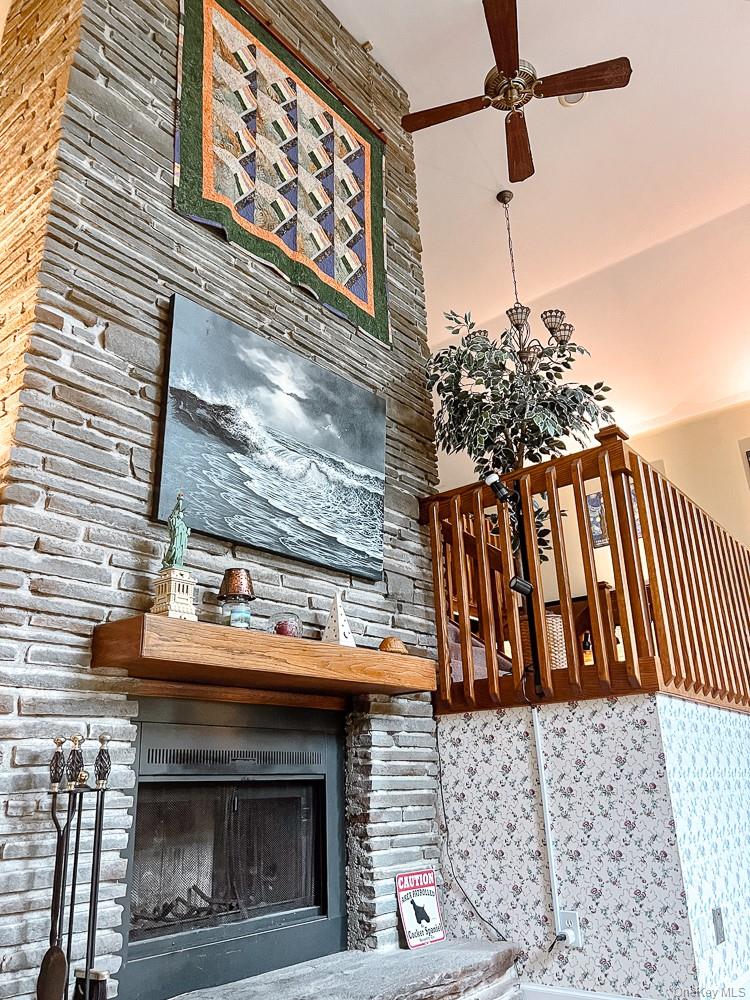 100 Old Tacy Road, Unit TR95 Bethel, NY 12783 - Photo 25 of 50 Detailed view of a ceiling fan and a fireplace